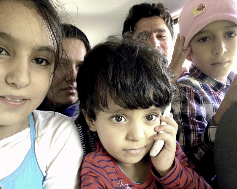 The refugee family that Robin and Robert transported to the registration center. Photo credit: Robin Shanti Jones